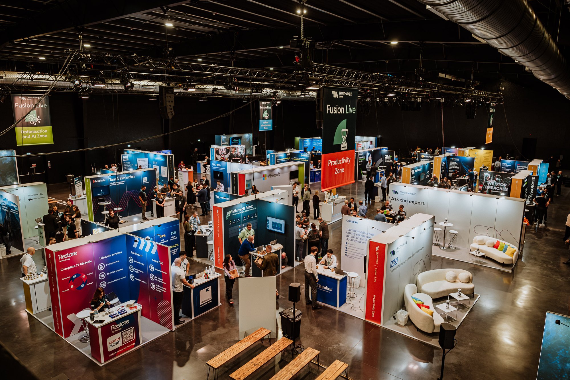 The 2025 Fusion live event in London with event stands and presentation areas.