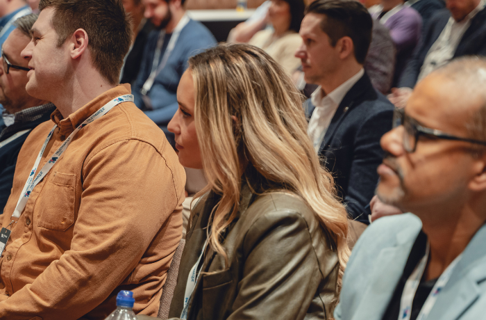 People listening to a presentation. 