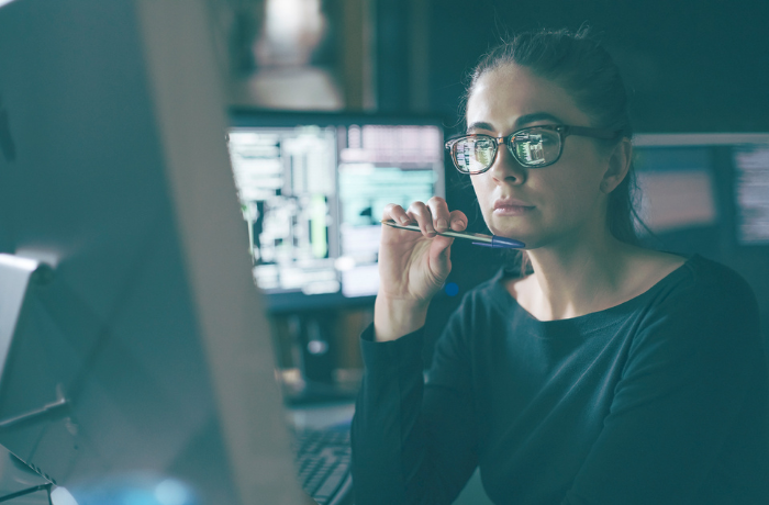 Woman looking at a computer screen