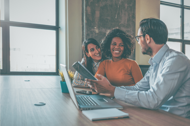 modern-business-team-smiling-at-work-768x513